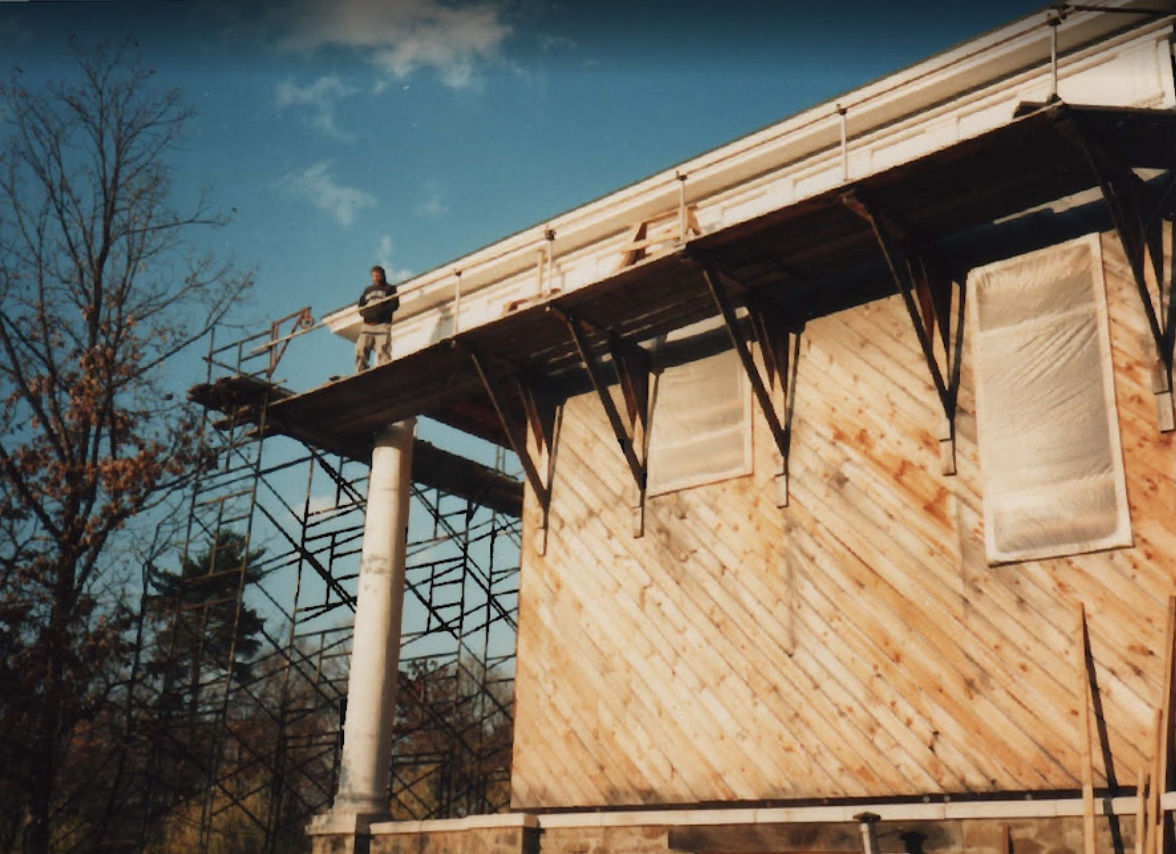 Scaffolding on the exterior during cladding